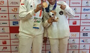 Cok Istri Agung Sanistyrani saat meraih medali perunggu Asian Games 2026 dari nomor kumite -55 kilogram yang dimainkan di Toyohashi City General Gymnasium, Jepang, Selasa (22/9/2026). (Foto: Ardy)
